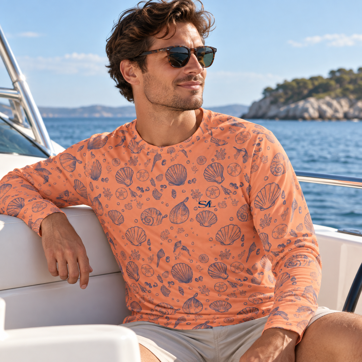 Man wearing Sunset Shores long-sleeve crew sun shirt on a boat