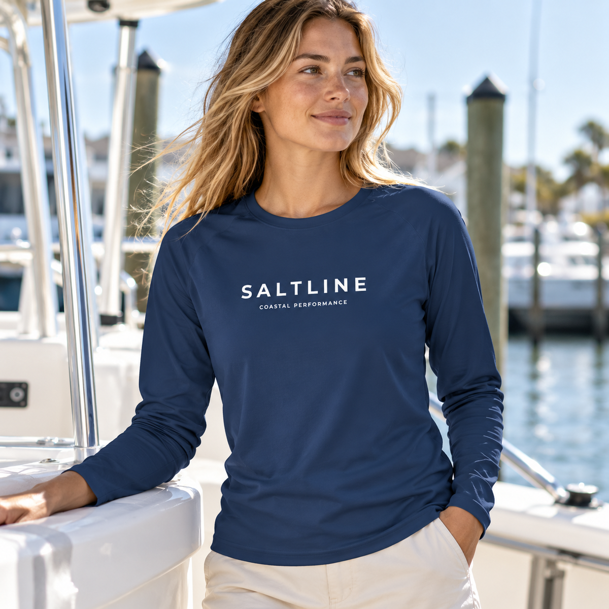 Woman wearing Deep Atlantic Coastal Performance Sun Shirt at a coastal marina