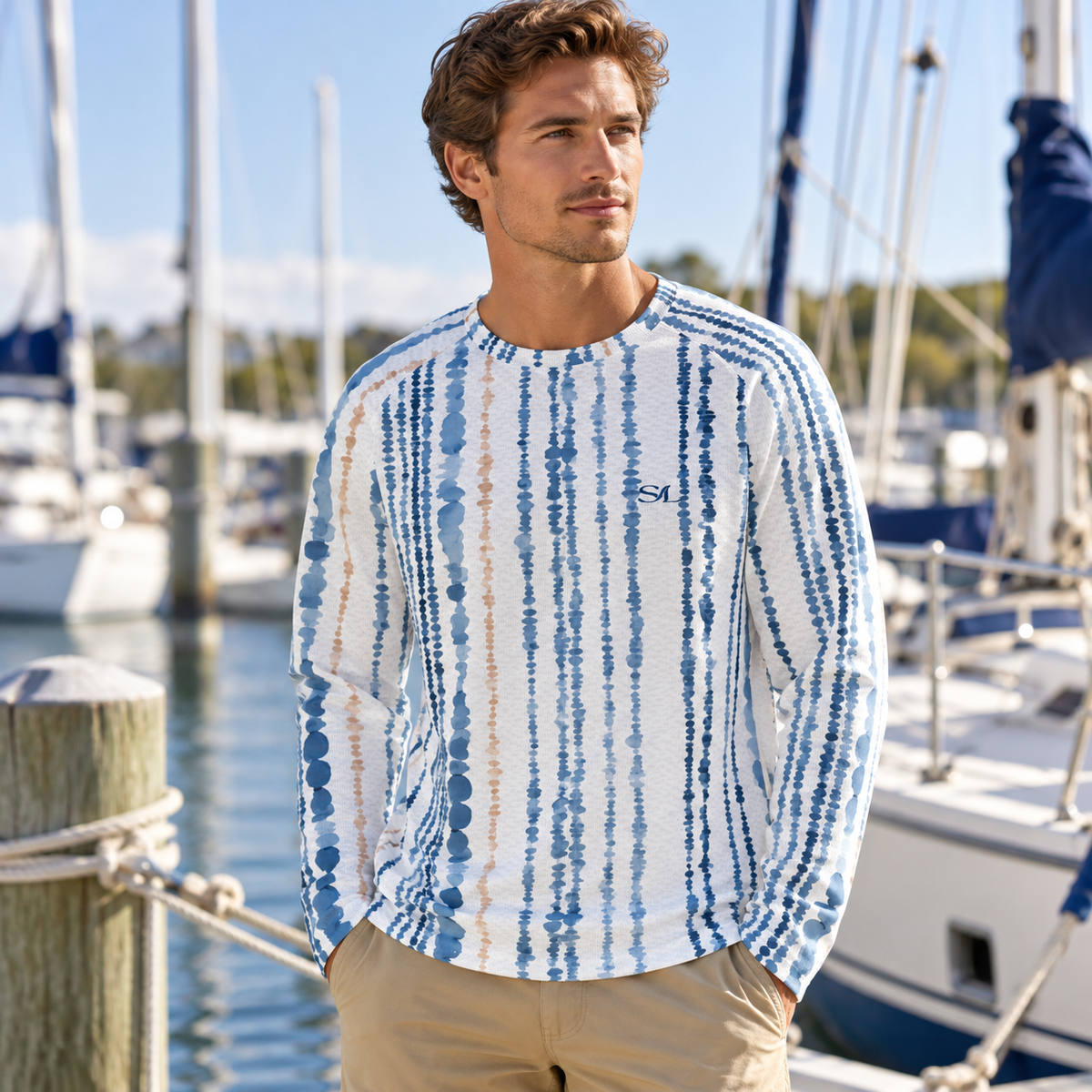Man wearing Maritime Stripe Sun Shirt in a coastal setting