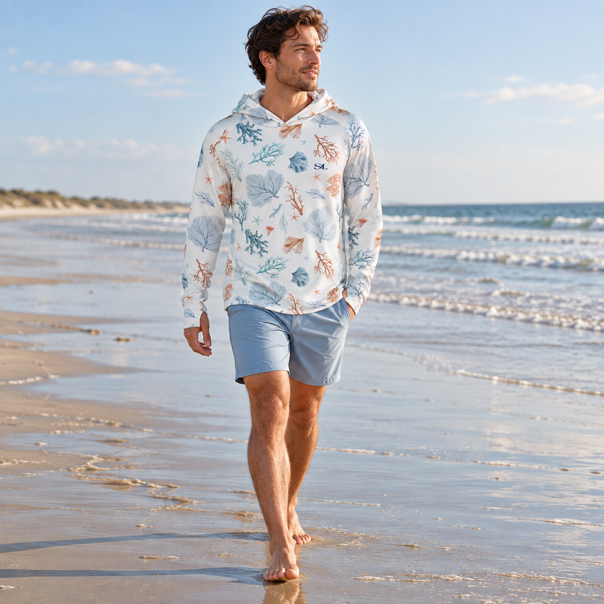 seaside m wide lifestyle view of Saltline sun hoodie