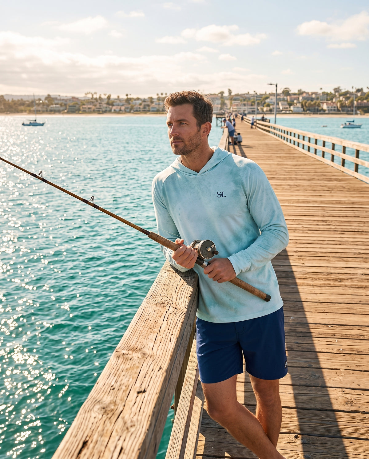 Saltline Sea Glass Teal UPF 50+ sun hoodie lifestyle image