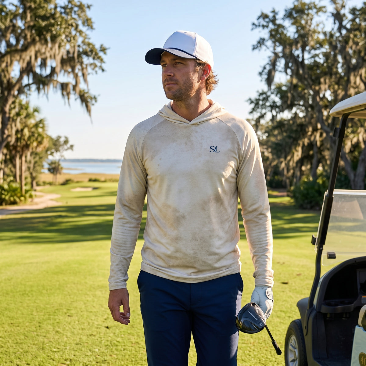 Saltline Sun-Bleached Sand UPF 50+ sun hoodie lifestyle image at the beach